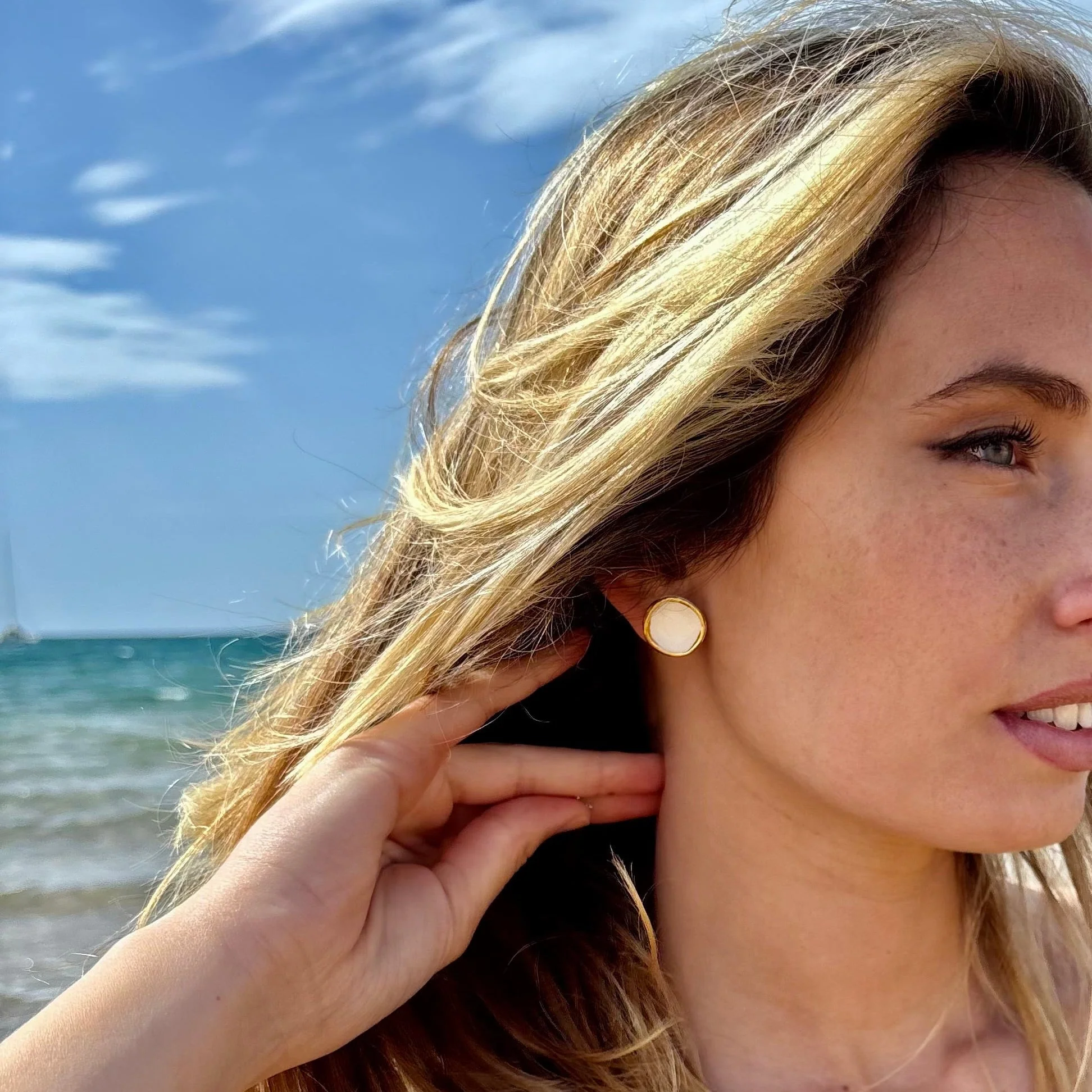 Camelia | Handcrafted white ceramic stud earrings with gold luster