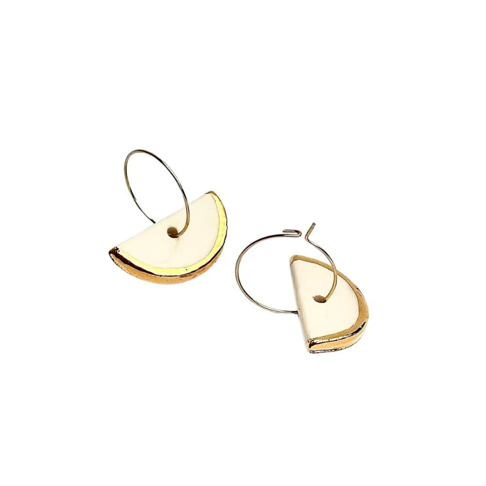Doraluna | Handcrafted white ceramic dangle earrings with gold luster - Image 2